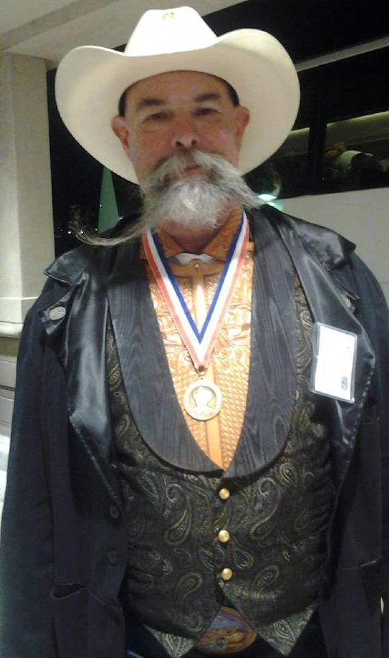 Wayne Al Stohlman award for achievement in leathercraft for his leatherwork teaching and promotion